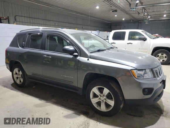 2012 Jeep Compass Sport with VIN 1C4NJCBB4CD579381, listed as a Copart auction lot 87043604 with 87,667 mi miles and Clean Title. Bid and sale history available at carsss.com. Image 4.