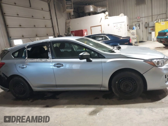 2019 Subaru Impreza z VIN 4S3GTAA6XK3751073, wystawiony jako IAAI lot #41727552 z przebiegiem 131 982 mil mil oraz . Historia ofert i sprzedaży dostępna na DreamBid. Obrazek 13.