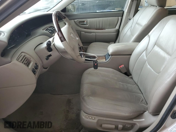 2003 Toyota Avalon XL z VIN 4T1BF28B03U280486, wystawiony jako Copart lot #57152935 z przebiegiem 131 996 mil mil oraz Szkoda całkowita • Salvage title. Historia ofert i sprzedaży dostępna na DreamBid. Obrazek 7.