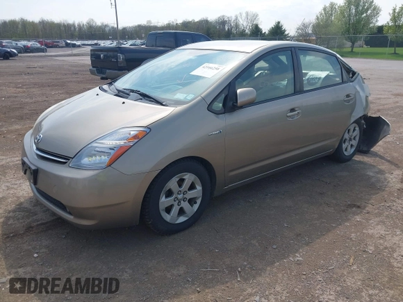 2007 Toyota Prius z VIN JTDKB20U073280948, wystawiony jako IAAI lot #42166258 z przebiegiem 236 628 mil mil oraz . Historia ofert i sprzedaży dostępna na DreamBid. Obrazek 2.
