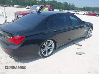 2013 BMW 7 Series 750Li xDrive with VIN WBAYF8C53DDE59223, listed as a IAAI auction lot 42602724 with 145,058 mi miles and . Bid and sale history available at DreamBid. Image 4.