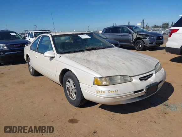 1996 Ford Thunderbird LX z VIN 1FALP62W3TH135238, wystawiony jako IAAI lot #41692746 z przebiegiem 136 464 mil mil oraz . Historia ofert i sprzedaży dostępna na DreamBid. Obrazek 1.