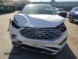 2019 Ford Edge Titanium z VIN 2FMPK3K99KBC62750, wystawiony jako Copart lot #57854045 z przebiegiem 57 327 mil mil oraz Szkoda całkowita • Salvage title. Historia ofert i sprzedaży dostępna na DreamBid. Obrazek 5.