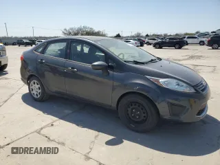 2011 Ford Fiesta S with VIN 3FADP4AJ7BM207132, listed as a Copart auction lot 49983905 with 88,734 mi miles and Clean title. Bid and sale history available at DreamBid. Image 4.