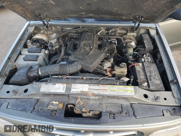 1999 Ford Explorer XLT z VIN 1FMZU34E3XZA39461, wystawiony jako Copart lot #74213774 z przebiegiem 119 937 mil mil oraz Szkoda całkowita • Salvage title. Historia ofert i sprzedaży dostępna na DreamBid. Obrazek 12.