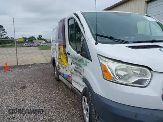 2015 Ford Transit Cargo with VIN 1FTNR1ZM7FKA88758, listed as a IAAI auction lot 42343294 with 133,914 mi miles and . Bid and sale history available at DreamBid. Image 6.