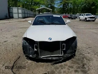 2012 BMW 1 Series 128i with VIN WBAUN1C50CVR00384, listed as a Copart auction lot 53232185 with 79,189 mi miles and Salvage title. Bid and sale history available at DreamBid. Image 14.
