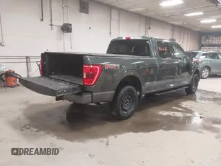 2021 Ford F-150 XL with VIN 1FTFW1E59MKD82204, listed as a IAAI auction lot 41466186 with 56,839 mi miles. Bid and sale history available at carsss.com. Image 4.