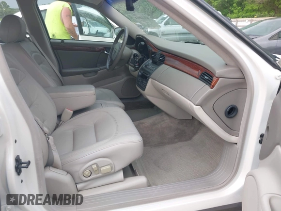 2003 Cadillac DeVille with VIN 1G6KD54Y93U179035, listed as a IAAI auction lot 42114653 with 112,591 mi miles. Bid and sale history available at carsss.com. Image 5.