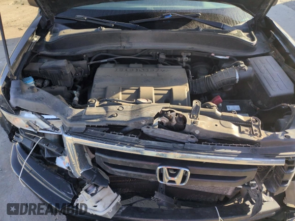 2011 Honda Ridgeline RT z VIN 5FPYK1F24BB009159, wystawiony jako Copart lot #51923715 z przebiegiem 121 639 mil mil oraz Szkoda całkowita • Salvage title. Historia ofert i sprzedaży dostępna na DreamBid. Obrazek 11.