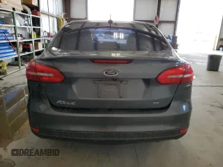 2017 Ford Focus SE with VIN 1FADP3F24HL260795, listed as a Copart auction lot 46895775 with Not provided miles and Salvage title. Bid and sale history available at DreamBid. Image 6.
