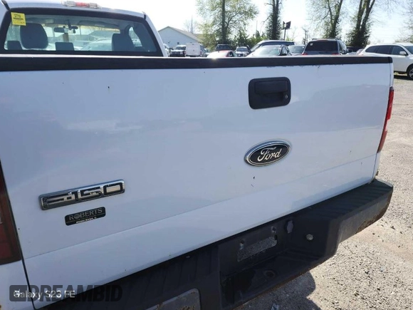2005 Ford F-150 XL with VIN 1FTRF12225NB00251, listed as a IAAI auction lot 42040220 with 94,122 mi miles. Bid and sale history available at carsss.com. Image 1.