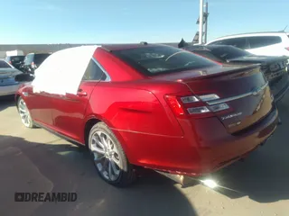 2018 Ford Taurus Limited with VIN 1FAHP2J83JG128648, listed as a IAAI auction lot 31515280 with Not provided miles and . Bid and sale history available at DreamBid. Image 3.