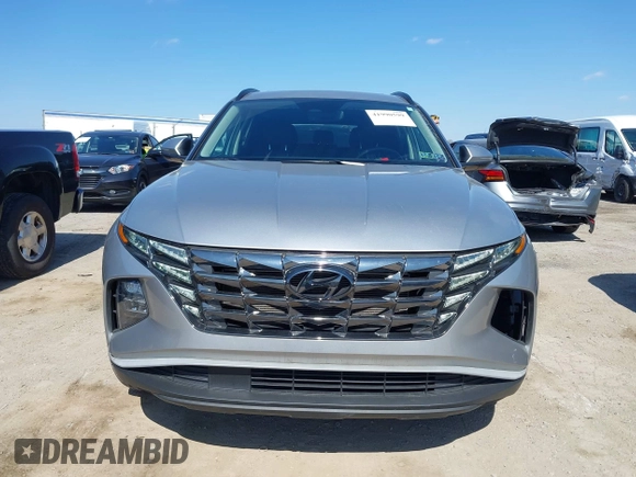 2022 Hyundai Tucson SEL with VIN 5NMJCCAE4NH078991, listed as a IAAI auction lot 41990599 with 37,384 mi miles and . Bid and sale history available at DreamBid. Image 13.