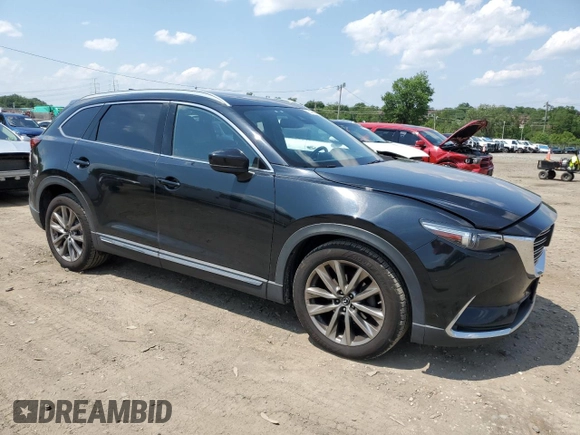 2018 Mazda CX-9 Grand Touring with VIN JM3TCBDY4J0232657, listed as a Copart auction lot 60405055 with 131,924 mi miles and Salvage title. Bid and sale history available at DreamBid. Image 4.