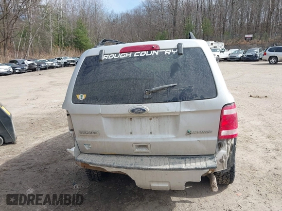 2010 Ford Escape Hybrid z VIN 1FMCU5K33AKC89835, wystawiony jako IAAI lot #41915349 z przebiegiem 125 659 mil mil oraz . Historia ofert i sprzedaży dostępna na DreamBid. Obrazek 16.