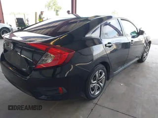 2018 Honda Civic LX with VIN 2HGFC2F53JH605760, listed as a IAAI auction lot 42032200 with 217,239 mi miles and . Bid and sale history available at DreamBid. Image 4.
