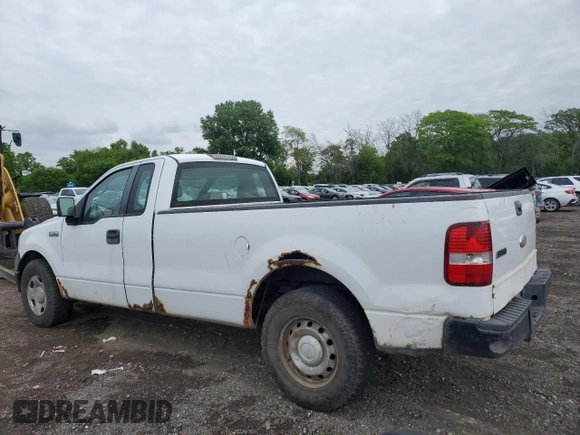 2007 Ford F-150 XL with VIN 1FTRF12247NA15687, listed as a Copart auction lot 57956945 with 303,421 mi miles and Clean title. Bid and sale history available at DreamBid. Image 2.