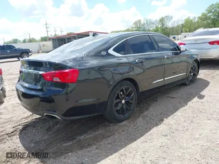 2014 Chevrolet Impala LTZ with VIN 1G1155S34EU145366, listed as a IAAI auction lot 41880712 with 171,000 mi miles. Bid and sale history available at carsss.com. Image 4.