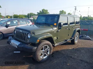 2015 Jeep Wrangler Unlimited Altitude с VIN 1C4HJWEG7FL584395, выставлен на аукционе IAAI как лот 42399987 с пробегом 142 906 миль миль и . История ставок и продаж доступна на DreamBid. Изображение 2.