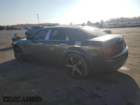 2005 Chrysler 300 with VIN 2C3JA53GX5H563815, listed as a Copart auction lot 81886344 with 144,630 mi miles and Salvage Title. Bid and sale history available at carsss.com. Image 2.