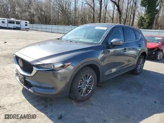 2021 Mazda CX-5 Touring with VIN JM3KFBCM2M1355728, listed as a Copart auction lot 48627455 with 51,340 mi miles and Salvage Title. Bid and sale history available at carsss.com. Image 1.