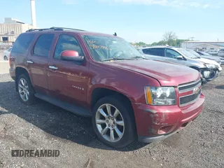 2009 Chevrolet Tahoe 2LT z VIN 1GNFK23079R138145, wystawiony jako IAAI lot #42109914 z przebiegiem 211 063 mil mil oraz . Historia ofert i sprzedaży dostępna na DreamBid. Obrazek 1.