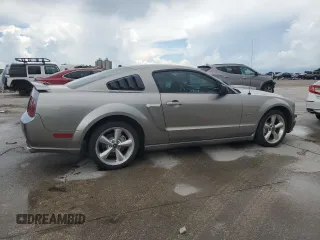 2008 Ford Mustang GT Deluxe с VIN 1ZVHT82H585115877, выставлен на аукционе Copart как лот 64524045 с пробегом 122 707 миль миль и Списание • Salvage title. История ставок и продаж доступна на DreamBid. Изображение 3.