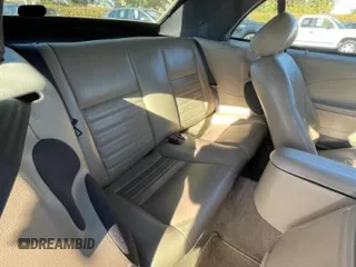 2004 Ford Mustang GT Deluxe z VIN 1FAFP45XX4F150757, wystawiony jako Copart lot #89221755 z przebiegiem 43 827 mil mil oraz Czysty tytuł • Clean title. Historia ofert i sprzedaży dostępna na DreamBid. Obrazek 6.