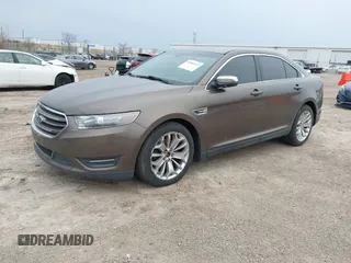 2015 Ford Taurus Limited with VIN 1FAHP2J84FG110702, listed as a IAAI auction lot 42060437 with 208,012 mi miles. Bid and sale history available at carsss.com. Image 2.