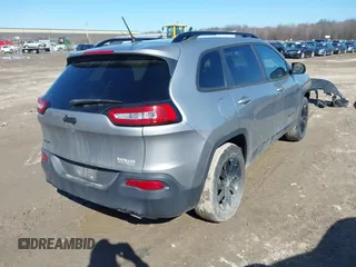 2014 Jeep Cherokee Latitude with VIN 1C4PJMCS7EW310179, listed as a IAAI auction lot 41757831 with 134,087 mi miles and . Bid and sale history available at DreamBid. Image 4.