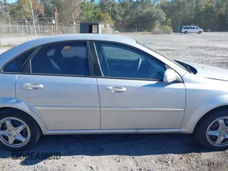 2008 Suzuki Forenza z VIN KL5JD56Z38K834698, wystawiony jako IAAI lot #40927796 z przebiegiem 187 973 mil mil oraz . Historia ofert i sprzedaży dostępna na DreamBid. Obrazek 13.