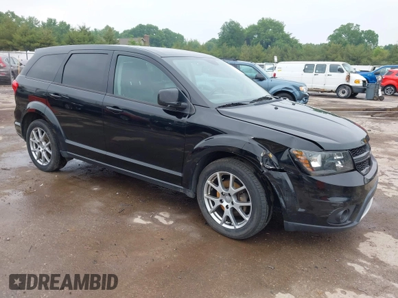 2015 Dodge Journey R/T with VIN 3C4PDDEG1FT554904, listed as a IAAI auction lot 42415888 with 143,039 mi miles and . Bid and sale history available at DreamBid. Image 1.