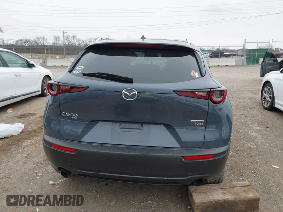 2021 Mazda CX-30 Premium with VIN 3MVDMBDY9MM241042, listed as a IAAI auction lot 41746326 with Not Provided miles and . Bid and sale history available at carsss.com. Image 16.