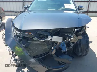 2022 Mazda CX-30 S Premium with VIN 3MVDMBDL5NM416649, listed as a IAAI auction lot 41990745 with 13,923 mi miles and . Bid and sale history available at DreamBid. Image 6.