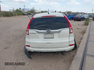 2015 Honda CR-V LX with VIN 5J6RM3H3XFL023217, listed as a IAAI auction lot 41950339 with Not Provided miles and . Bid and sale history available at carsss.com. Image 16.