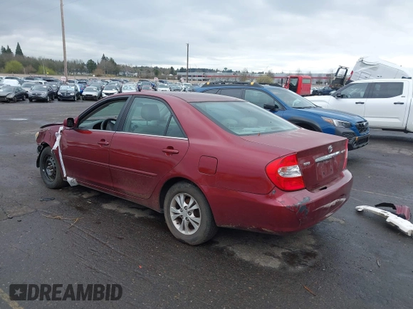 2005 Toyota Camry LE with VIN 4T1BF32K95U092132, listed as a IAAI auction lot 41831969 with 103,466 mi miles and . Bid and sale history available at DreamBid. Image 3.