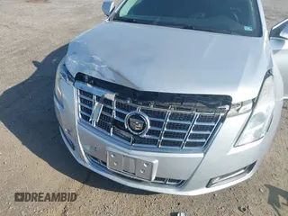 2013 Cadillac XTS with VIN 2G61N5S31D9135710, listed as a IAAI auction lot 42002480 with 162,029 mi miles. Bid and sale history available at carsss.com. Image 6.