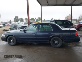 2001 Ford Crown Victoria Police Police Interceptor with VIN 2FAFP71WX1X127347, listed as a IAAI auction lot 41134745 with 161,180 mi miles. Bid and sale history available at carsss.com. Image 14.