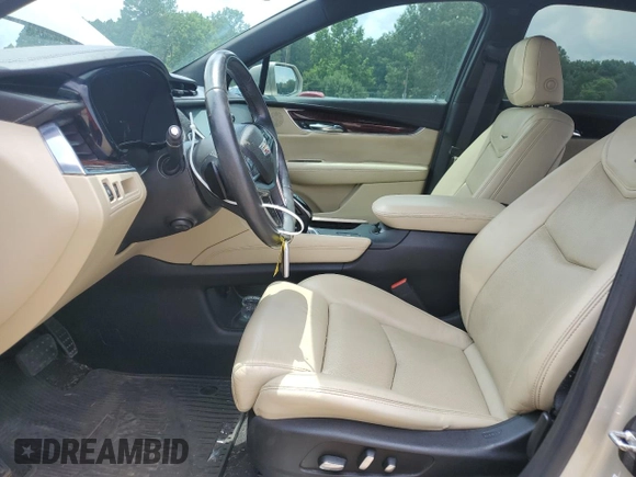 2017 Cadillac XT5 Luxury FWD with VIN 1GYKNBRS3HZ210457, listed as a Copart auction lot 58439225 with 139,938 mi miles and Salvage title. Bid and sale history available at DreamBid. Image 7.