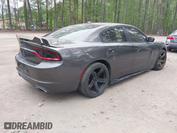 2015 Dodge Charger RT with VIN 2C3CDXCT3FH730588, listed as a IAAI auction lot 42023763 with 118,634 mi miles and . Bid and sale history available at DreamBid. Image 4.