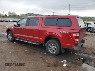 2021 Ford F-150 XL with VIN 1FTFW1ED7MFB28328, listed as a Copart auction lot 56223375 with 60,815 mi miles and Salvage title. Bid and sale history available at DreamBid. Image 2.