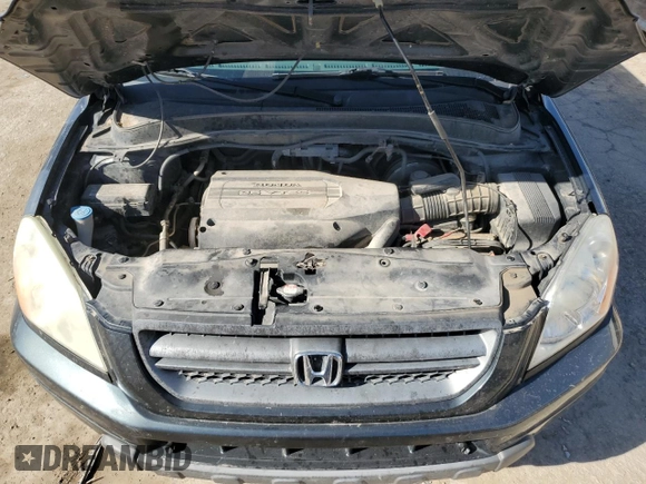 2004 Honda Pilot EX with VIN 2HKYF18534H587990, listed as a Copart auction lot 43003585 with 283,562 mi miles and Salvage Title. Bid and sale history available at DreamBid. Image 12.