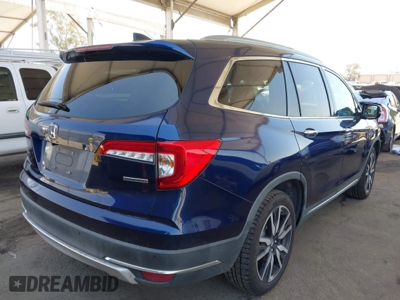 2019 Honda Pilot Touring 8-Passenger z VIN 5FNYF5H97KB013530, wystawiony jako IAAI lot #42403449 z przebiegiem 90 557 mil mil oraz . Historia ofert i sprzedaży dostępna na DreamBid. Obrazek 4.