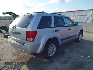 2005 Jeep Grand Cherokee Laredo with VIN 1J8GS48K35C591154, listed as a IAAI auction lot 42107302 with 196,237 mi miles and . Bid and sale history available at DreamBid. Image 4.
