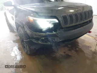 2020 Jeep Cherokee Trailhawk Elite with VIN 1C4PJMBN2LD538076, listed as a IAAI auction lot 42219282 with 53,773 mi miles and . Bid and sale history available at DreamBid. Image 6.