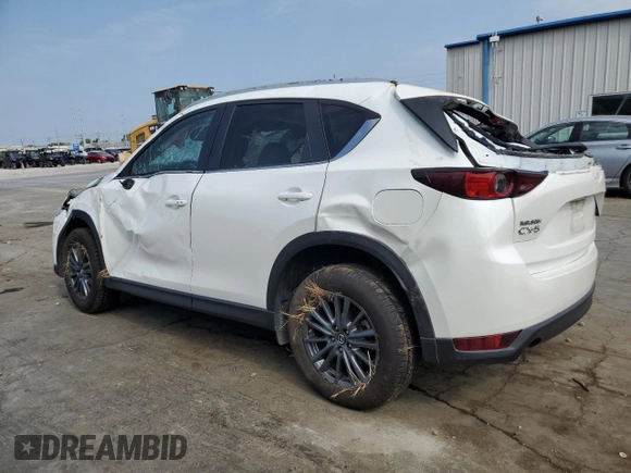 2021 Mazda CX-5 Touring with VIN JM3KFACM1M0405129, listed as a Copart auction lot 67874724 with 49,618 mi miles and Salvage Title. Bid and sale history available at carsss.com. Image 2.