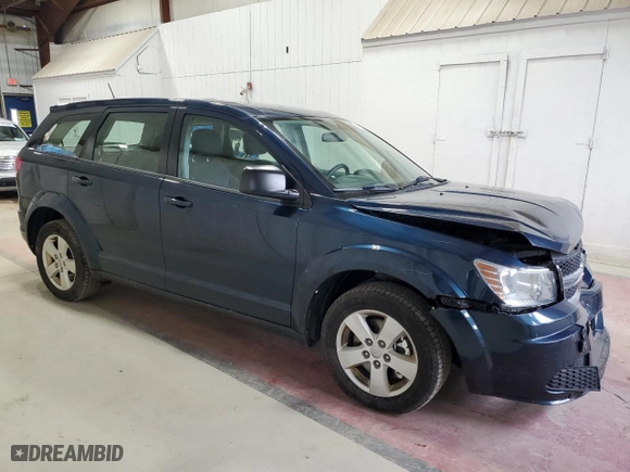 2013 Dodge Journey American Value Pkg with VIN 3C4PDCAB6DT560702, listed as a Copart auction lot 53048435 with 124,467 mi miles and Salvage Title. Bid and sale history available at carsss.com. Image 4.