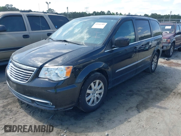 2016 Chrysler Town & Country Touring with VIN 2C4RC1BG8GR297243, listed as a IAAI auction lot 42143705 with 140,728 mi miles. Bid and sale history available at carsss.com. Image 17.