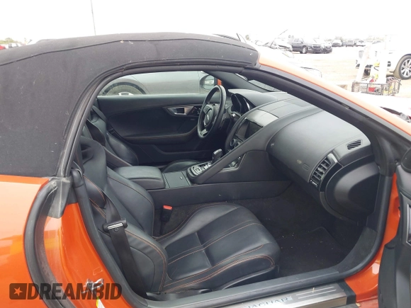 2014 Jaguar F-Type V6 with VIN SAJWA6E77E8K06989, listed as a IAAI auction lot 41286537 with 54,977 mi miles and . Bid and sale history available at DreamBid. Image 5.
